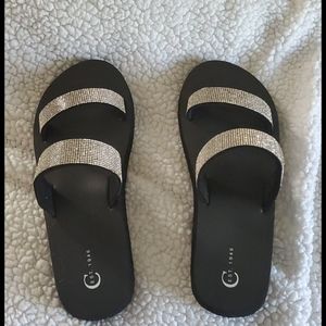 Silver shiny and black slip ons